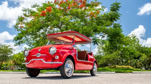 Rare 1959 Fiat 500 Jolly with just 6,313 miles and a quirky surrey top is up for sale at £78,000. Perfect for beach lovers, this iconic model offers timeless seaside charm.