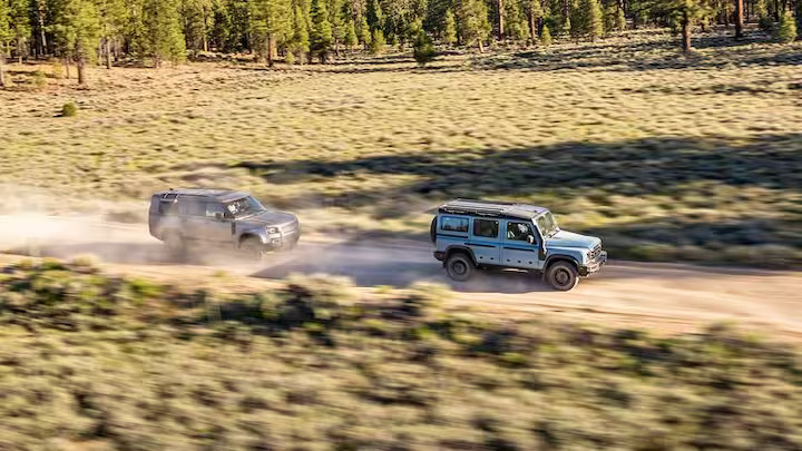 The 2024 Ineos Grenadier and 2024 Land Rover Defender 130 go head-to-head in our comparison test, blending nostalgic charm with state-of-the-art convenience.