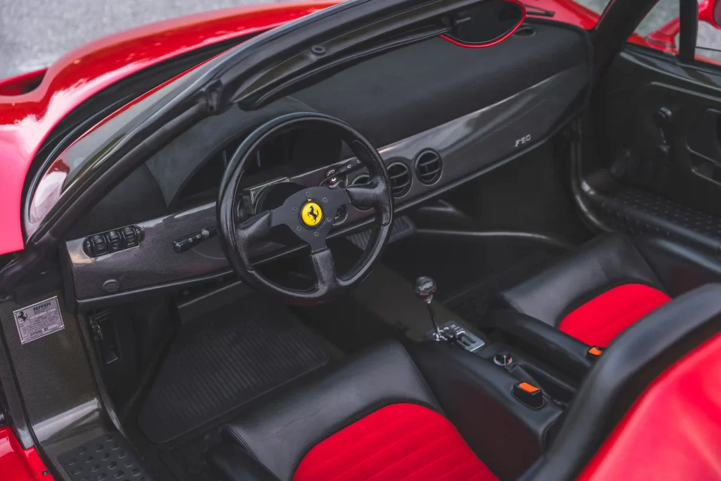 An extremely rare 1995 Ferrari F50 with just 8,556 miles heads to auction for £3.95 million. This iconic model, once owned by A-listers, features a V-12 engine and luxurious interior.