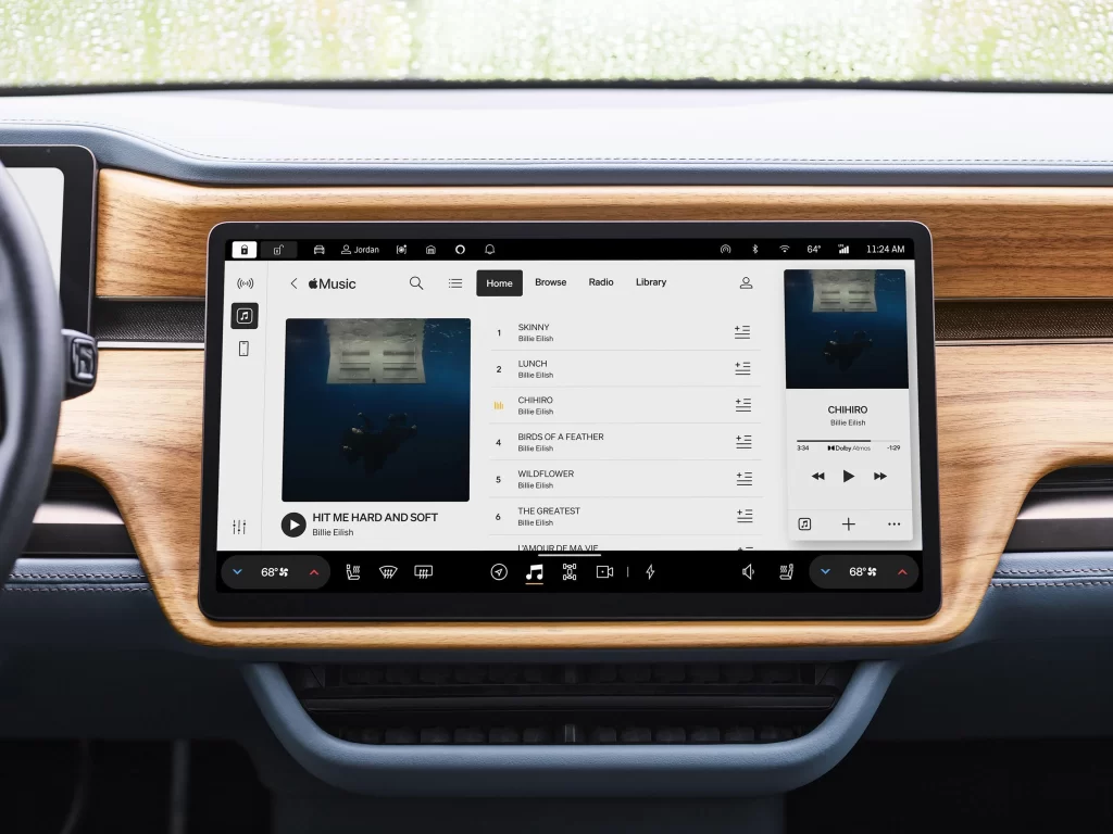 Apple Music and Rivian team up to bring Spatial Audio with Dolby Atmos to Rivian vehicles, offering an immersive music experience with over 100 million songs directly through Rivian's software.