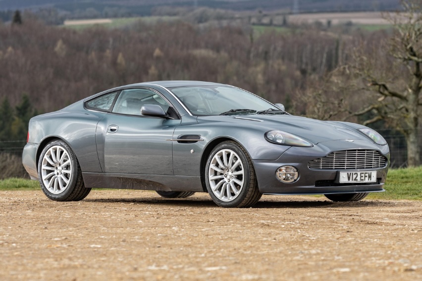 Hugh Grant's 2002 Aston Martin Vanquish heads to auction, expected to fetch £65,000. The sleek sports car, featured in 'About a Boy,' has just 39,300 miles on the clock.