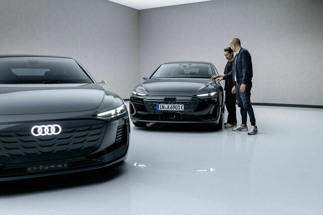 Sascha Heyde and Wolf Seebers, Audi exterior designers and friends for 20 years, bring their vision to life with the Audi A6 e-tron. From concept to reality, they share insights on shaping this innovative electric vehicle family, highlighting the collaborative journey and design influences.