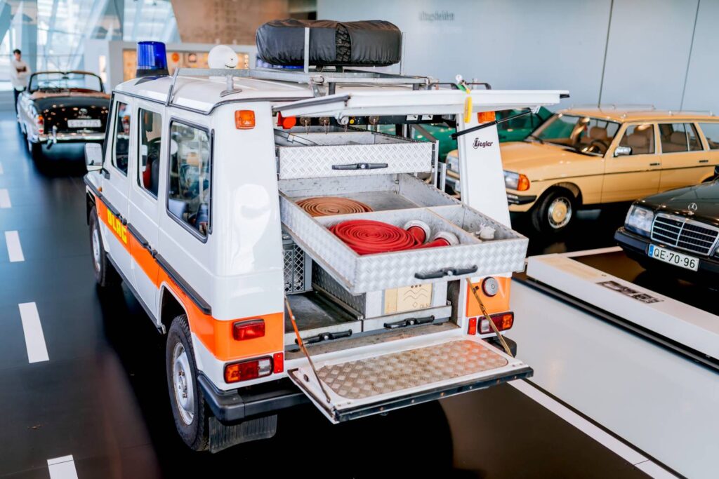 The Mercedes-Benz Museum highlights the DLRG’s iconic 1982 Mercedes-Benz 230 G, a beach and water rescue vehicle, showcasing its legacy of safety and service in challenging terrains.