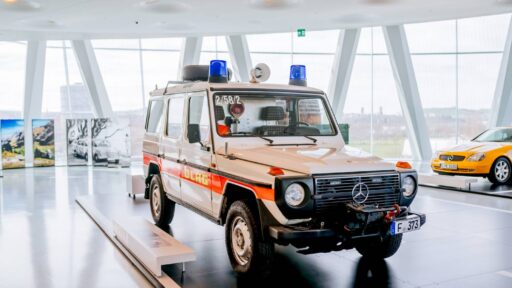 The Mercedes-Benz Museum highlights the DLRG’s iconic 1982 Mercedes-Benz 230 G, a beach and water rescue vehicle, showcasing its legacy of safety and service in challenging terrains.