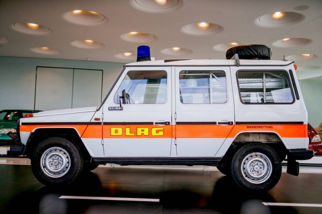 The Mercedes-Benz Museum highlights the DLRG’s iconic 1982 Mercedes-Benz 230 G, a beach and water rescue vehicle, showcasing its legacy of safety and service in challenging terrains.