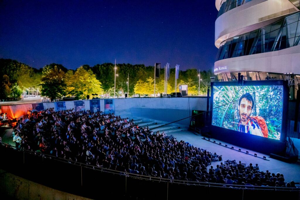 Enjoy open-air cinema under the stars at the Mercedes-Benz Museum from August 22 to September 8, 2024. Featuring blockbuster hits, family films, and documentaries in a stunning outdoor setting.