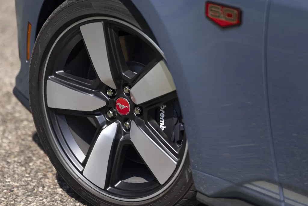 Ford celebrates the Mustang’s 60th anniversary with a special edition package featuring the iconic Brittany Blue paint, limited to 1,965 units, offering a blend of heritage and modern performance.