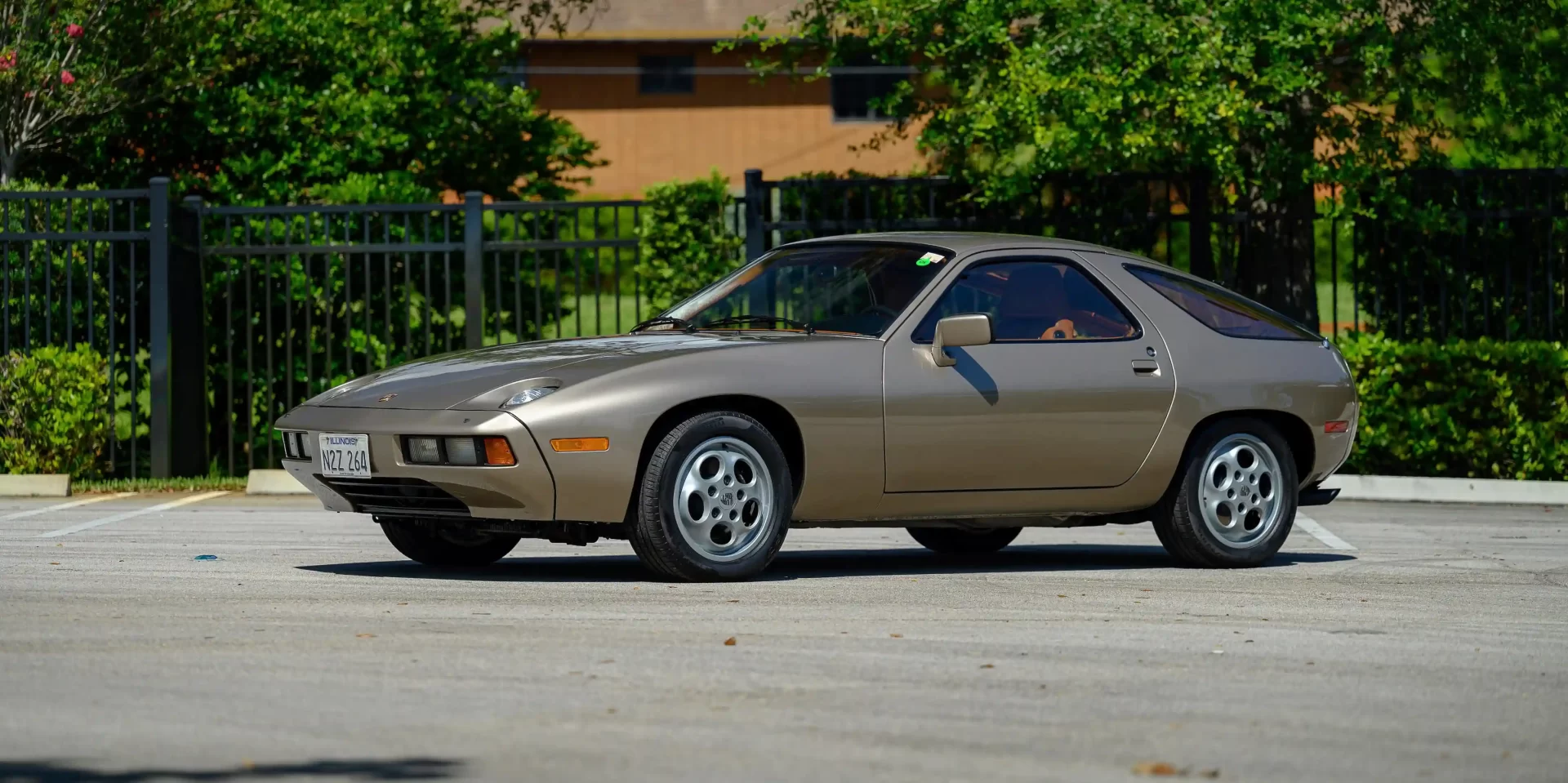 Own a piece of Hollywood history! The 1979 Porsche 928 from "Risky Business," driven by Tom Cruise, is up for auction with an estimated price of £1.4 million.