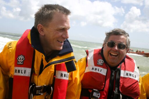 Ex-007 Daniel Craig donates his personal limited edition Bond motorcycles for auction, raising funds for RNLI's 200th anniversary. A unique gift supporting lifesavers.