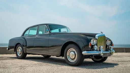 A rare 1965 Bentley S3 Continental, once owned by actor Leslie Nielsen, is up for auction at £155,000. Fully restored, this classic car features a V8 engine and luxury amenities.