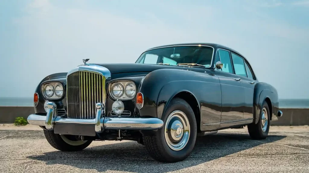 A rare 1965 Bentley S3 Continental, once owned by actor Leslie Nielsen, is up for auction at £155,000. Fully restored, this classic car features a V8 engine and luxury amenities.