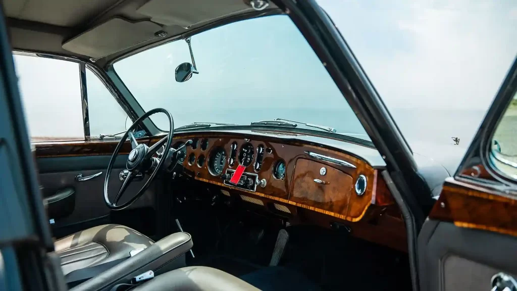 A rare 1965 Bentley S3 Continental, once owned by actor Leslie Nielsen, is up for auction at £155,000. Fully restored, this classic car features a V8 engine and luxury amenities.