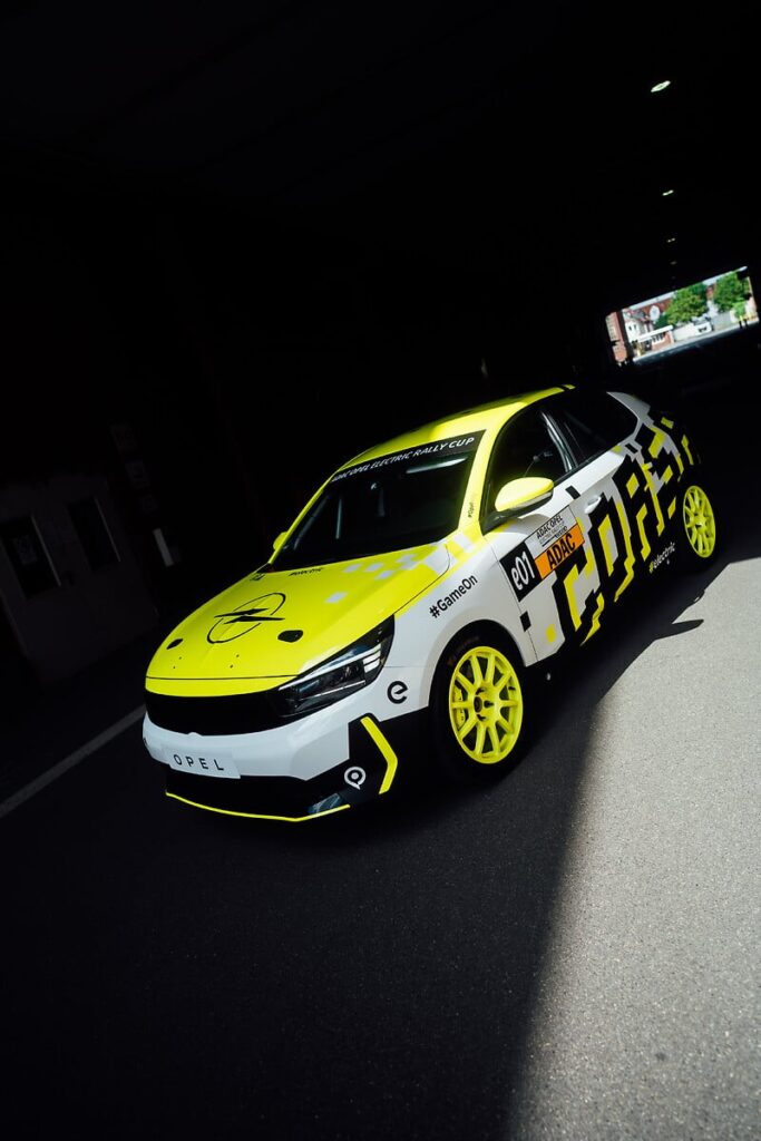 Opel debuts the eye-catching Corsa Rally Electric in a special "Gamescom" design at Cologne’s Gamescom, showcasing innovation in electric rallying with bold colors and cutting-edge technology.