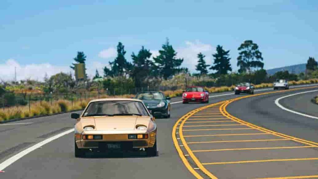 The Porsche Club on Hawaii's Big Island, led by President Gunner Mench, blends a passion for Porsche with the island’s "Aloha" spirit, showcasing camaraderie and dramatic landscapes.