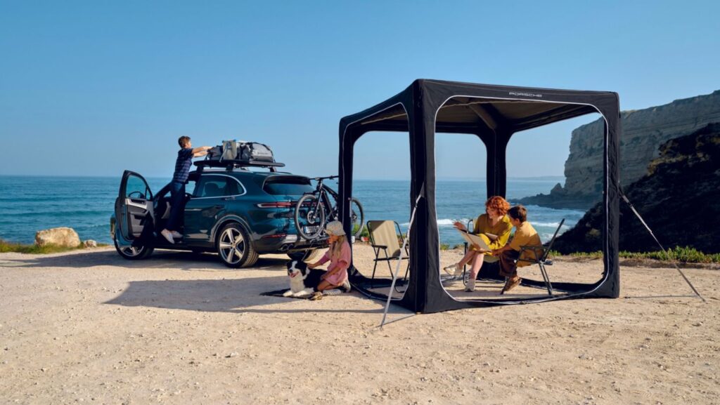 Porsche introduces the versatile Canopy Tent, offering multifunctional weather protection and cozy lounging. Complementing the popular Roof Tent, it elevates the luxury camping experience.