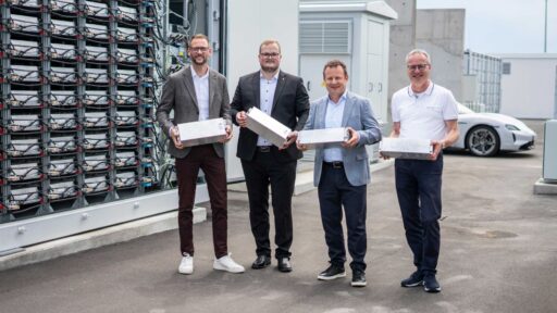 Porsche repurposes 4,400 used Taycan battery modules for a 5MW energy storage system at the Leipzig plant, enhancing sustainability and optimizing energy supply with the Second Life initiative.