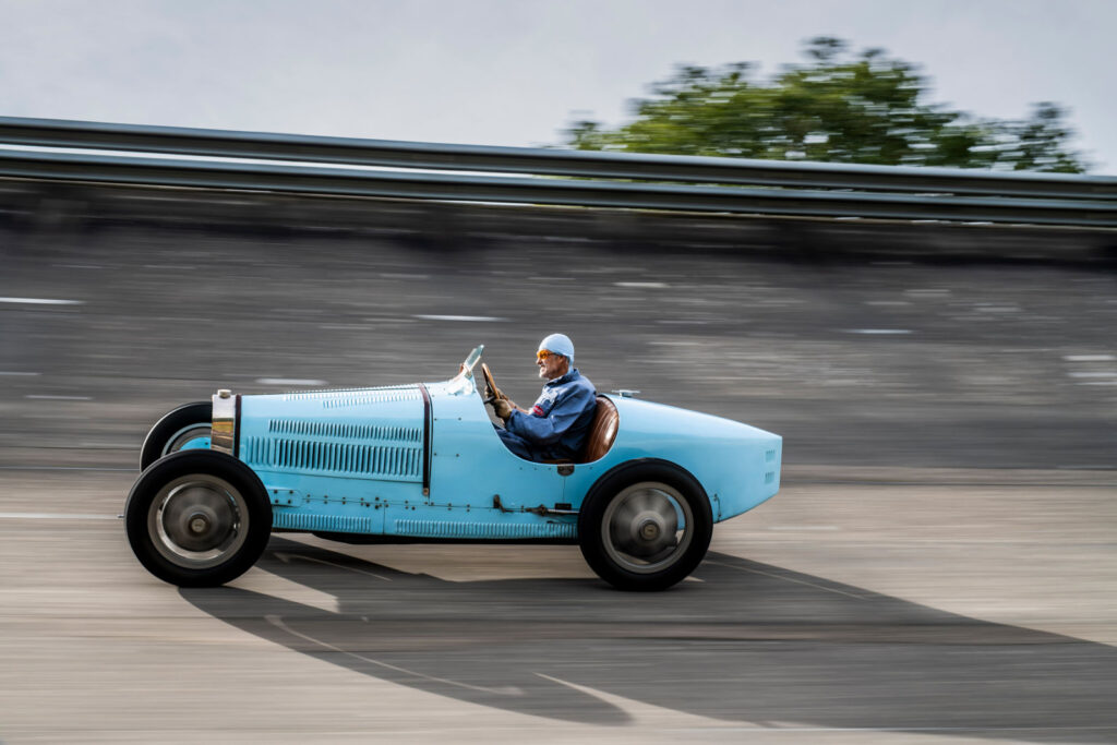 The Bugatti Type 35, an iconic race car, dominated motorsports in the 1920s with victories at events like the Targa Florio and Grand Prix, securing its legendary status in racing history.