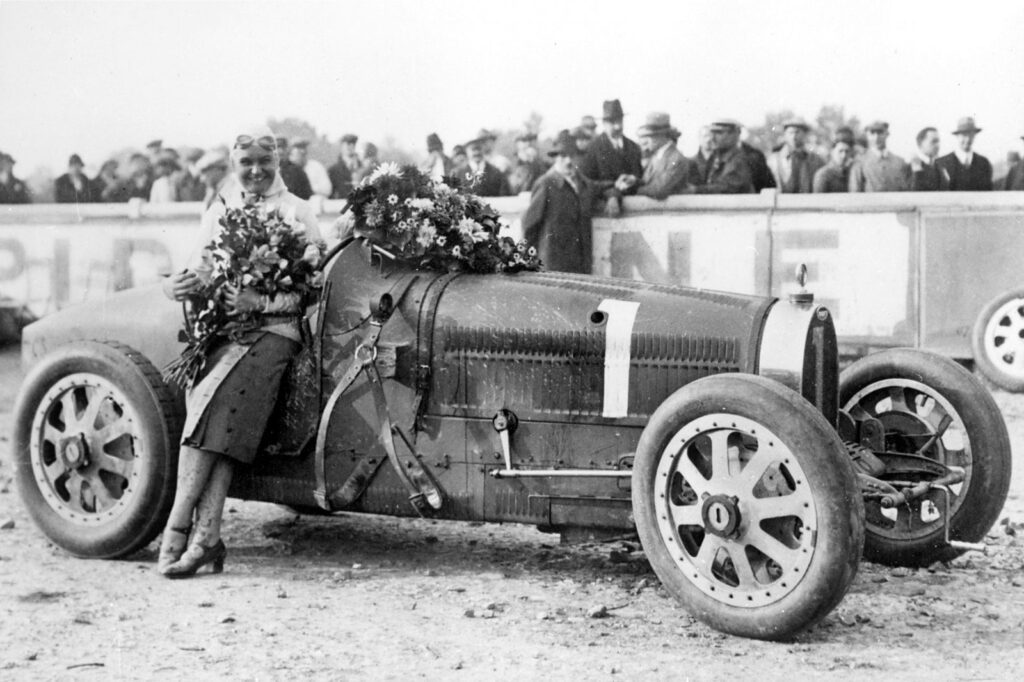 The Bugatti Type 35, an iconic race car, dominated motorsports in the 1920s with victories at events like the Targa Florio and Grand Prix, securing its legendary status in racing history.