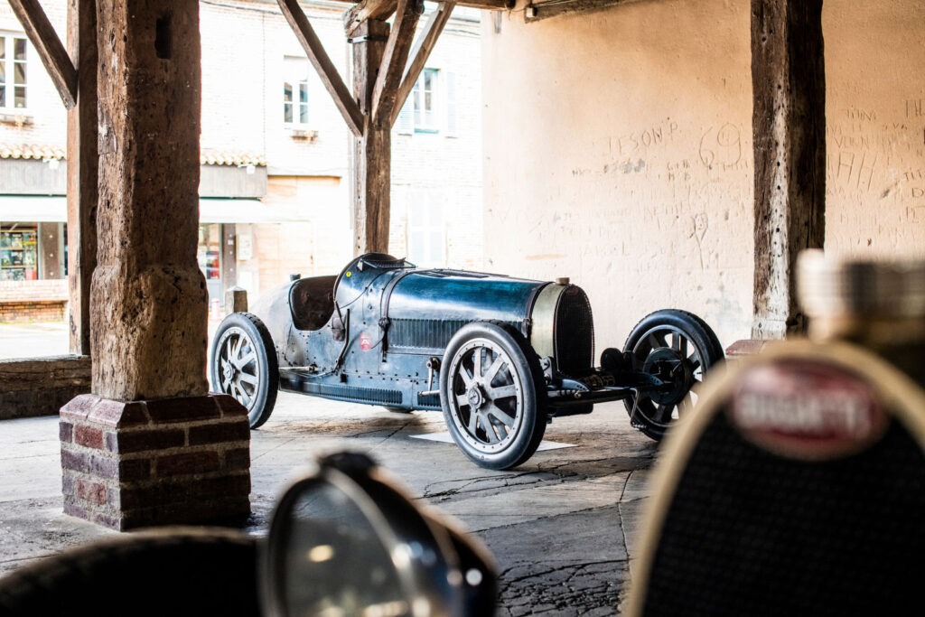 The Bugatti Type 35, an iconic race car, dominated motorsports in the 1920s with victories at events like the Targa Florio and Grand Prix, securing its legendary status in racing history.