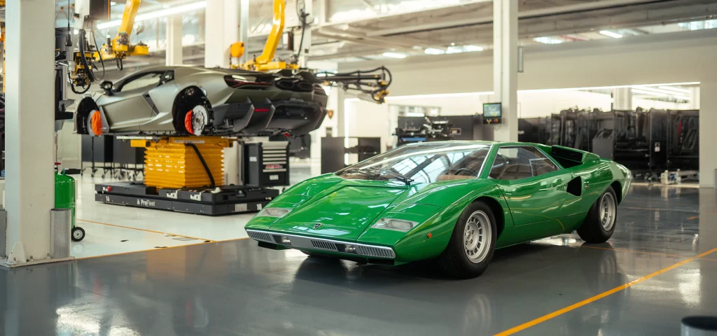 Lamborghini celebrates 50 years since the first Countach was produced in Sant'Agata Bolognese, honoring its iconic legacy and influence on modern models like the Revuelto.