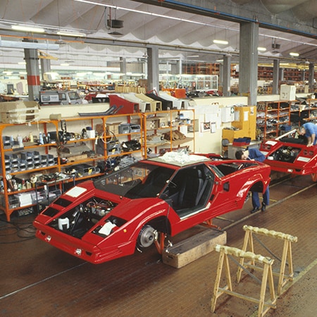 Lamborghini celebrates 50 years since the first Countach was produced in Sant'Agata Bolognese, honoring its iconic legacy and influence on modern models like the Revuelto.