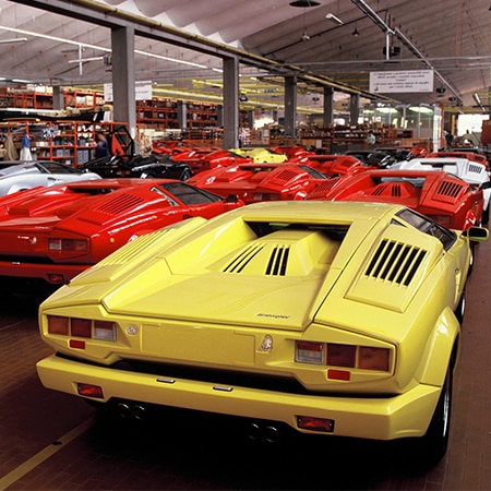 Lamborghini celebrates 50 years since the first Countach was produced in Sant'Agata Bolognese, honoring its iconic legacy and influence on modern models like the Revuelto.