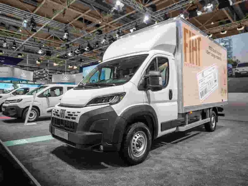 FIAT Professional unveils its fully transformed E-Ducato Cargo Box at IAA Transportation 2024, featuring 18.3 m³ cargo capacity, 200 kW electric power, and customization through its new CustomFit program.