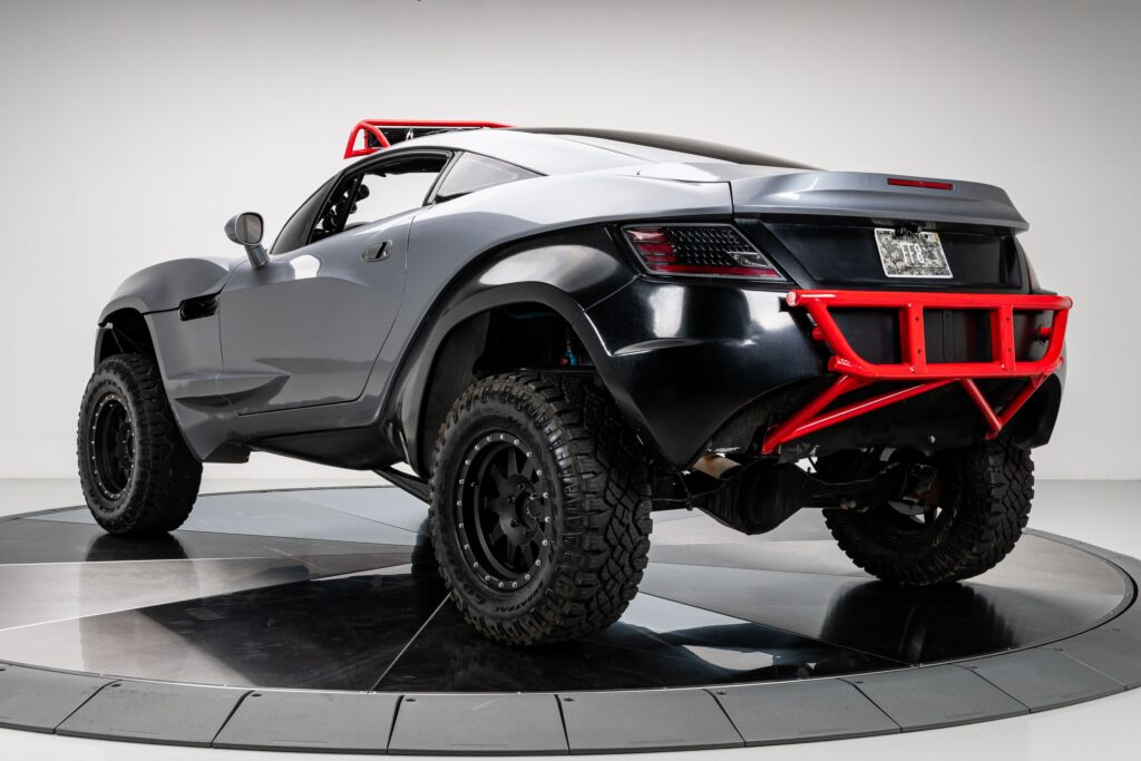 Fast & Furious 8's iconic 2013 Local Motors Rally Fighter, driven by Michelle Rodriguez, sells for £88,000. This rare, street-legal off-roader with 556 HP now has a new owner.