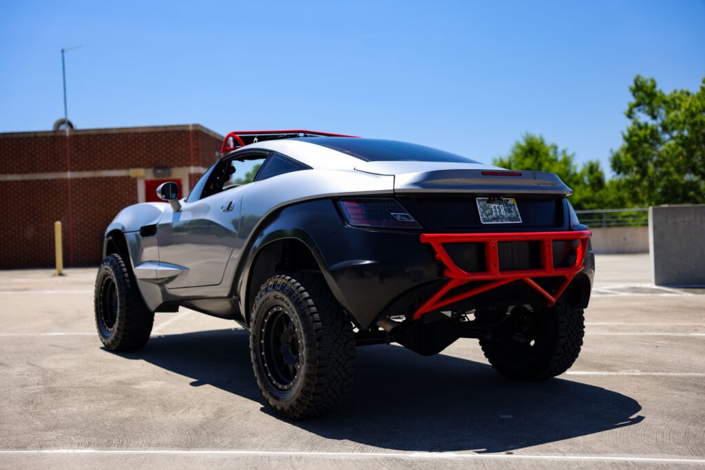 Fast & Furious 8's iconic 2013 Local Motors Rally Fighter, driven by Michelle Rodriguez, sells for £88,000. This rare, street-legal off-roader with 556 HP now has a new owner.