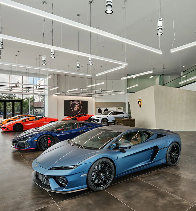 Lamborghini opens a stunning new showroom in San Antonio, Texas, showcasing their full lineup, including hybrid models. Experience personalized customization through Lamborghini Ad Personam.