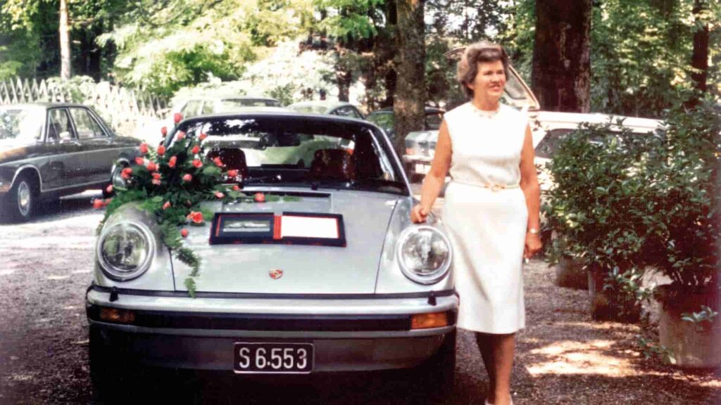 In 1974, Porsche gifted Louise Piëch the first 911 Turbo “No. 1” for her 70th birthday, a symbol of her influence in the Porsche family and a milestone in high-performance car history.