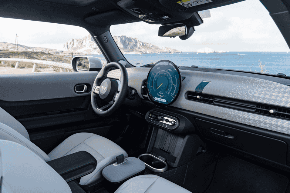 The MINI Cooper C blends classic driving fun with innovative in-car gaming, featuring a sleek design, 156 hp engine, and advanced tech, offering a unique entertainment experience on the road.