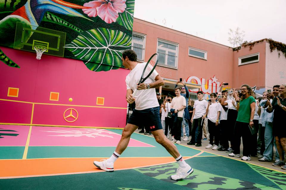 Mercedes-Benz and Roger Federer launch the Neon Legacy project in Berlin, unveiling a vibrant tennis wall at a local youth club, promoting tennis and supporting young talent.