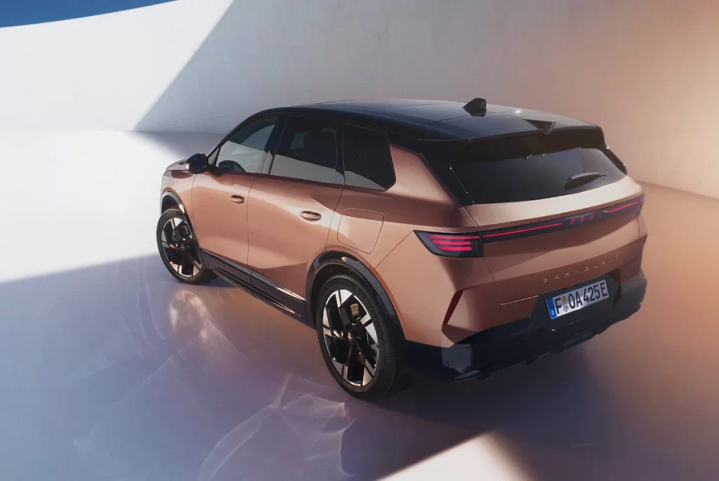 Opel's new Grandland SUV blends bold design with sustainability, offering electrified variants, recycled materials, and eco-friendly features like chrome-free elements and emissions-free driving.