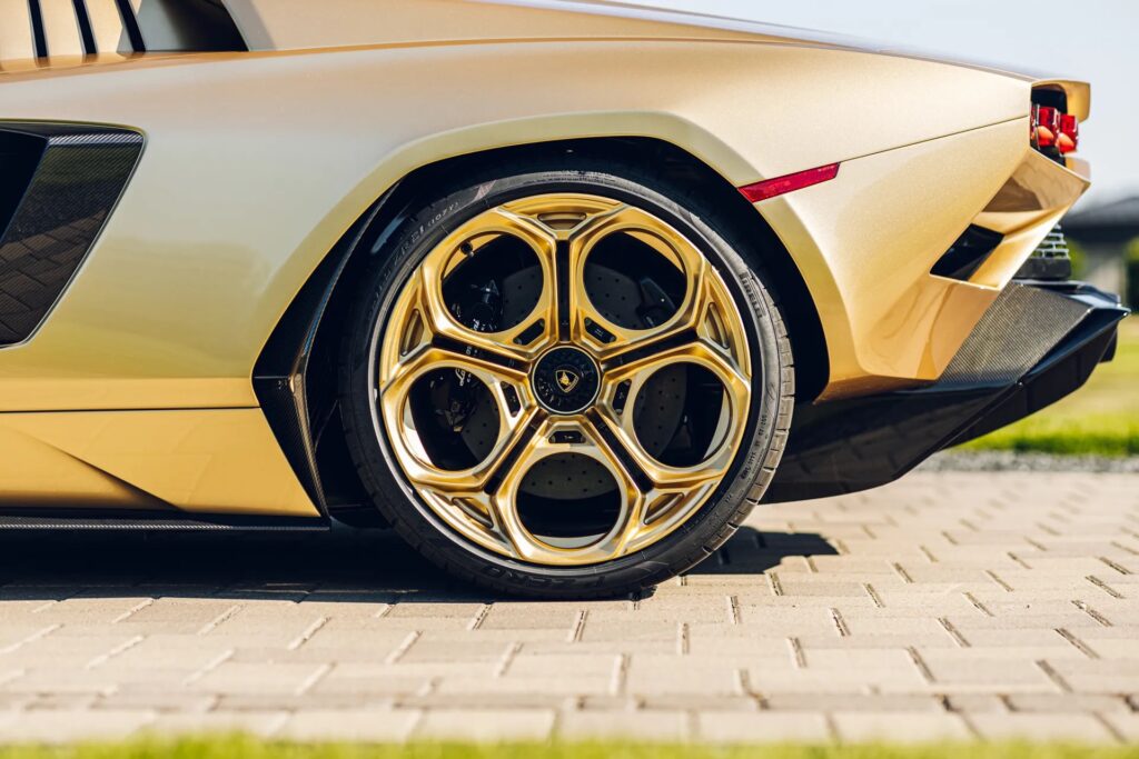 A rare 2022 gold Lamborghini Countach with just 85 miles on the clock is up for auction at £1.7 million, one of only 112 made, featuring a powerful 6.5L V12 engine.