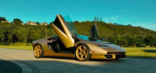 A rare 2022 gold Lamborghini Countach with just 85 miles on the clock is up for auction at £1.7 million, one of only 112 made, featuring a powerful 6.5L V12 engine.