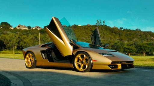 A rare 2022 gold Lamborghini Countach with just 85 miles on the clock is up for auction at £1.7 million, one of only 112 made, featuring a powerful 6.5L V12 engine.