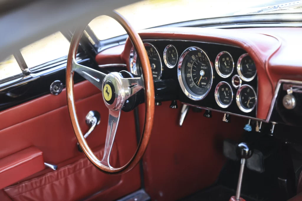 Angelina Jolie's rare 1958 Ferrari 250 GT, one of only 353 ever made, is up for auction at £670,000. The classic black coupé with red leather interior will be sold in Paris.