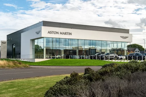 Aston Martin enhances its UK retail presence with the opening of new ultra-luxury dealerships in Birmingham and Leeds, offering personalized experiences and expanding its customer service network.