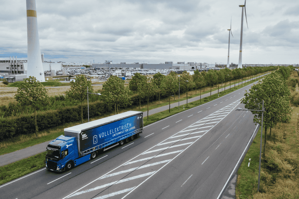 BMW Group introduces electric trucks at its Leipzig plant, reducing CO2 emissions by 9 tonnes annually while transporting EV components, part of a broader sustainable logistics initiative.