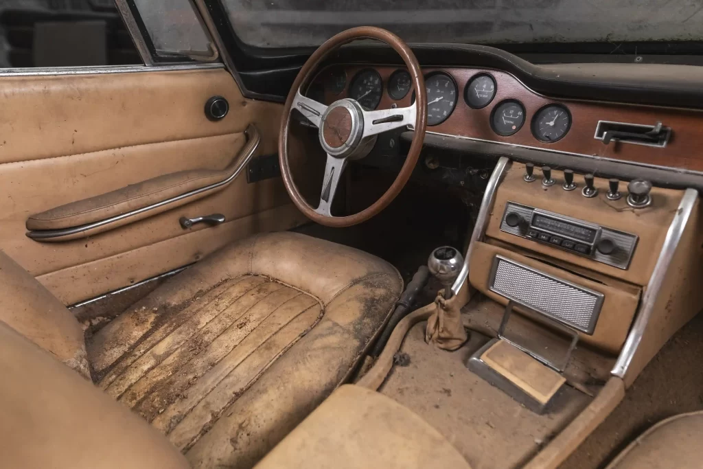 Rare 1964 Iso Grifo A3/L Spider, the only convertible of its kind, set for auction at £765,000 after 40 years in storage. A unique classic car ready for restoration!