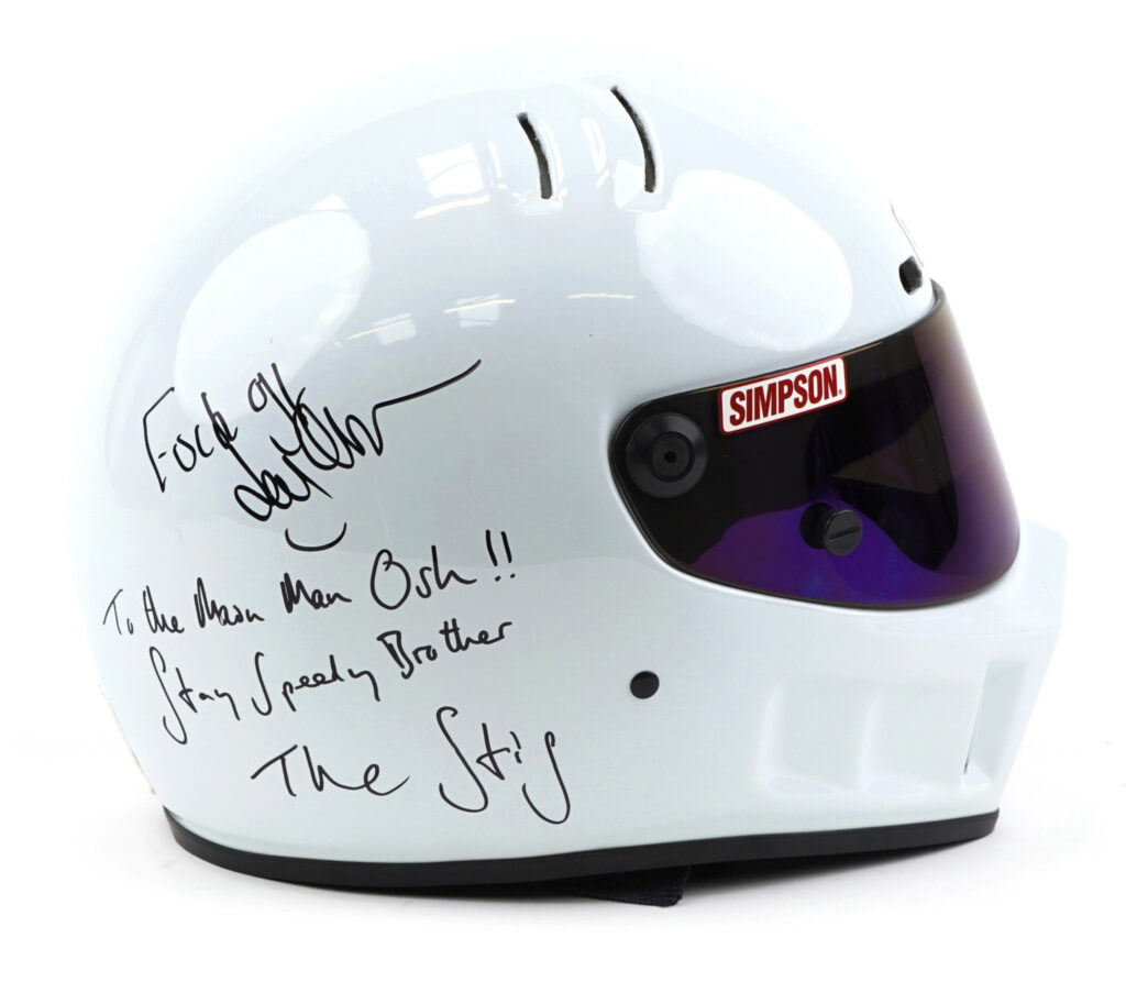 A controversial Top Gear helmet, signed "F*ck off" by Jeremy Clarkson, sold for £3,800 at auction after being linked to producer Oisin Tymon following their 2015 spat.