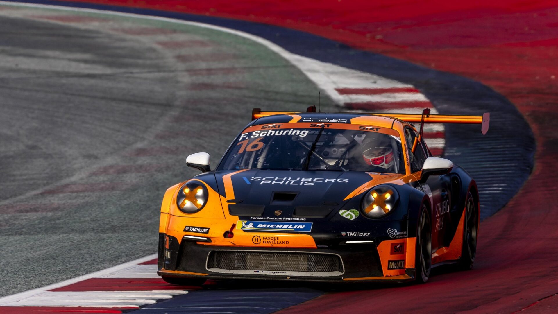 Dutch rookie Flynt Schuring secures his first Porsche Carrera Cup Deutschland win at Red Bull Ring, holding off title contender Harry King in a thrilling race, with King finishing second.