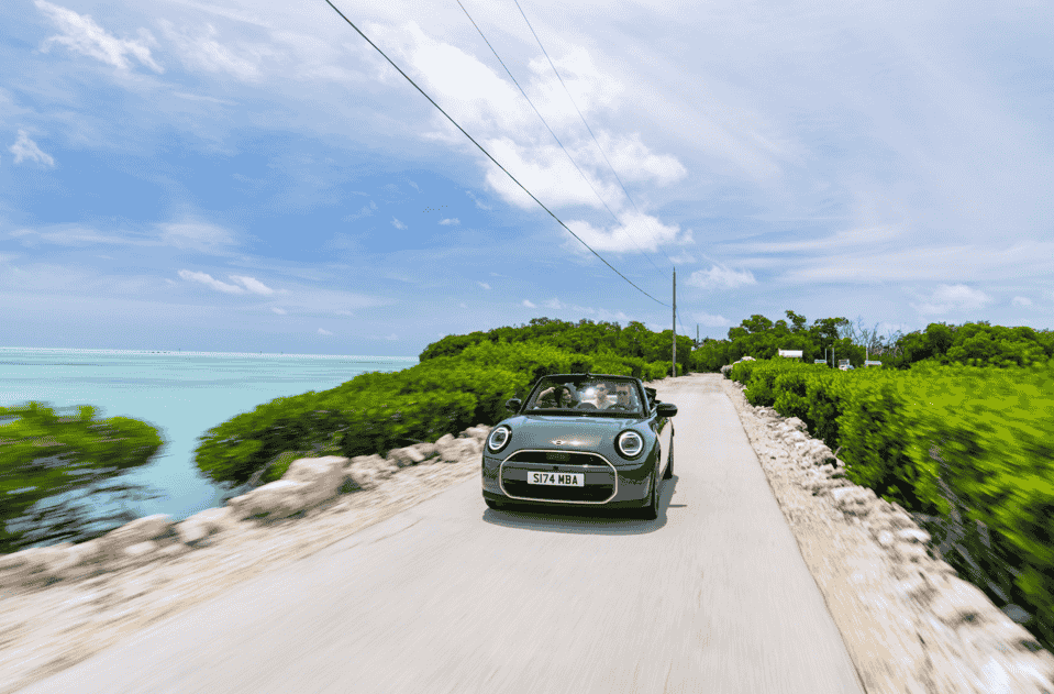 MINI's new Cooper Convertible delivers open-air driving with a fully automatic soft top, sleek design, advanced tech features, and three engine options, offering pure driving pleasure.