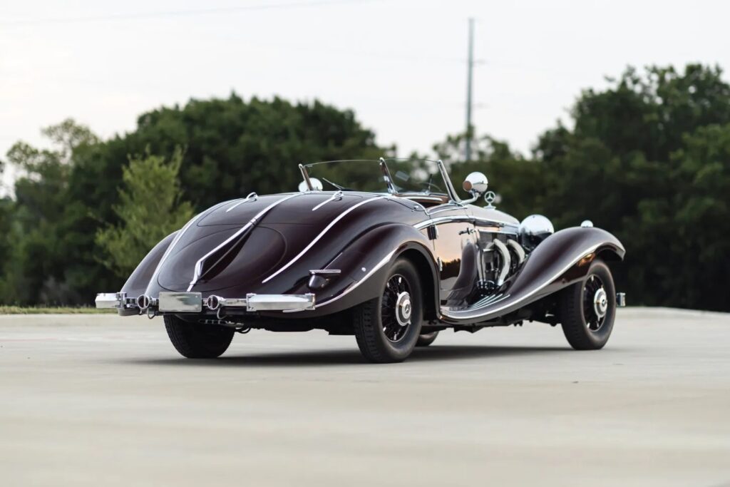 Restored 1934 Mercedes-Benz 500 K, rebuilt after surviving WWII, set to sell for £777,000. With only 43,000 miles, this rare classic boasts a 5.1-litre engine and rich history.