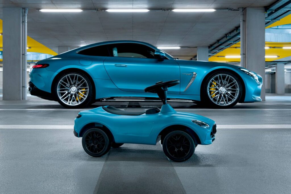 Mercedes-Benz introduces the 7th generation Bobby-AMG GT ride-on car for kids, featuring enhanced ergonomics, realistic design, and available in hyper blue with LED lights or sun yellow.