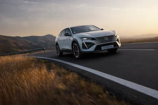 PEUGEOT debuts the all-electric E-408, featuring a 210 hp motor, 453 km range, advanced connectivity, and sleek fastback design, offering dynamic performance and zero-emission driving.