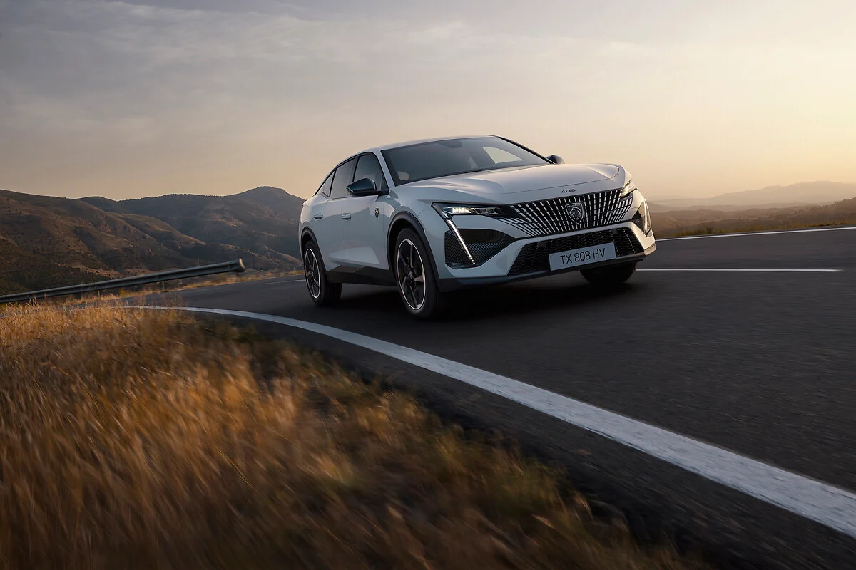 PEUGEOT debuts the all-electric E-408, featuring a 210 hp motor, 453 km range, advanced connectivity, and sleek fastback design, offering dynamic performance and zero-emission driving.