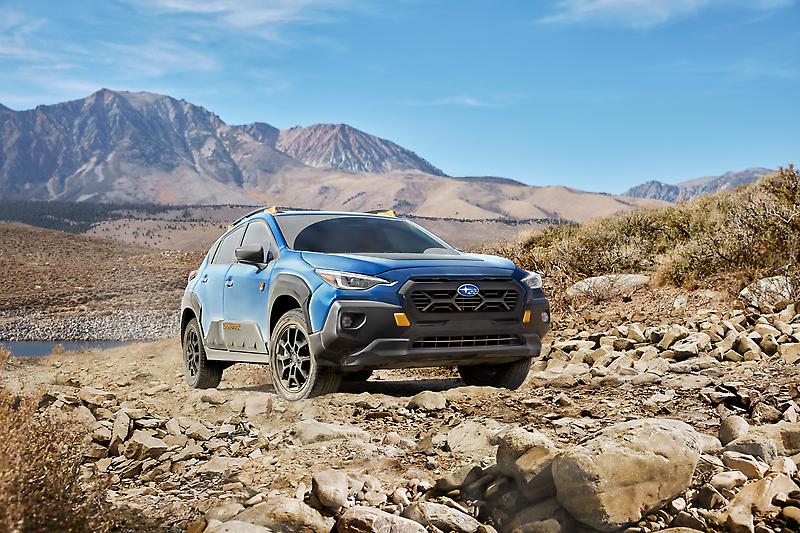 Subaru announces pricing for the 2025 Crosstrek, starting at $25,695, featuring updated styling, improved handling, and the rugged Wilderness model for enhanced off-road capabilities.