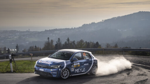 Belgian driver Tom Heindrichs wins the ADAC Opel Electric Rally Cup finale in Lower Bavaria, while Anthony Rott secures second place overall despite a late setback in the Power Stage.